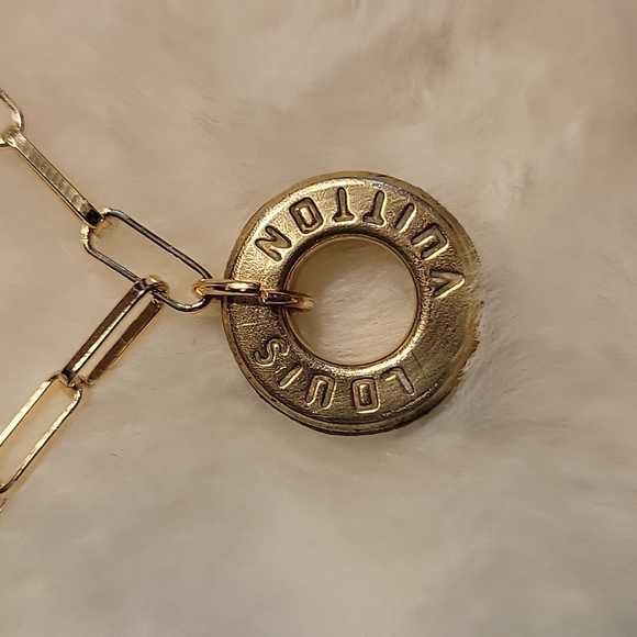 Authentic Louis Vuitton brass grommet circle Charm on a necklace - Picture 2 of 4